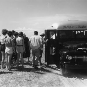 Group boarding Hatteras - Manteo bus at Manteo, North Carolina, 4-H Camp