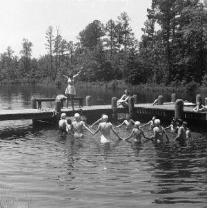 Group of 4-H club members excercising in water at Millstone 4-H Camp