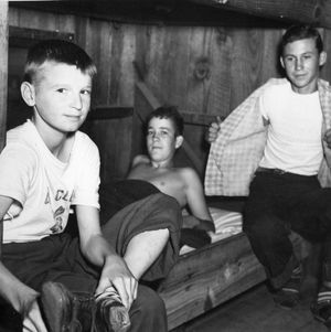 Three 4-H club boys in bunkhouse at Millstone 4-H Camp
