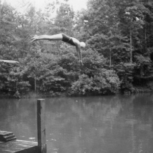 4-H club member diving into water at Millstone 4-H Camp, 1936