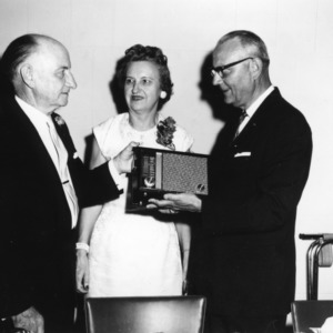 L. R. Harrill presenting an award at the Honor Dinner