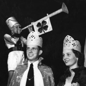 North Carolina State 4-H Club king and queen of health being trumpeted by a herald