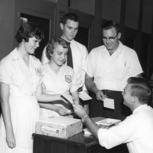Participants registering for North Carolina State 4-H Club Week, July 1958