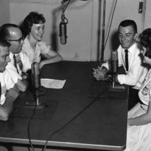 4-H club members participating in a radio show at North Carolina State 4-H Club Week at North Carolina State College