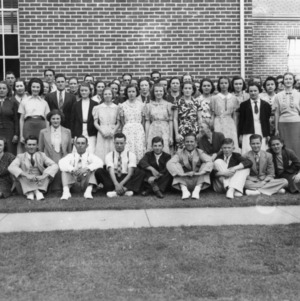 4-H club members standing in front of the Lenoir County Recreation Institute in May 1938