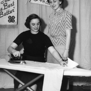 Mary Faye Jackson of Surry County, North Carolina, ironing a shirt at the National 4-H Club Congress