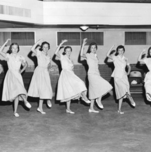 4-H club girls demonstrating a dance during North Carolina State 4-H Club Week