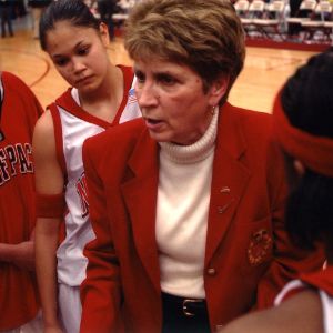 Kay Yow with players during time out
