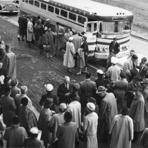 Delegates boarding a bus at the National 4-H Club Congress