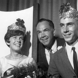 Left to right, Kay Sloop of Iredell County, Dr. T. C. Blalock the Assistant Director of 4-H, and Sam G. Hall, Jr. of Iredell County being crowned the North Carolina 4-H king and queen of health