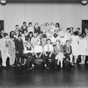 4-H club members from Buncombe County, North Carolina, applying theater make-up to five club members' faces as part of a "making up characters" exercise at a dramatic institute, May 26-29, 1930
