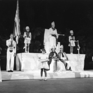 4-H health pageant at North Carolina State 4-H Club Week held at North Carolina State College in Raleigh. The king and queen of health are seated in the middle