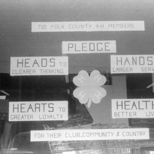 4-H club window exhibit created by Polk County, displaying the 4-H Pledge