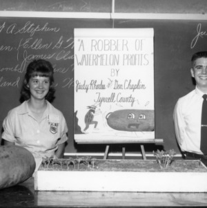 Judy Rhodes and Don Chaplin of Tyrrell County, North Carolina giving an etymology demonstration on "A Robber of Watermelon Profits."