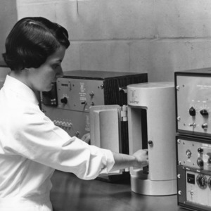 Woman technician working in a radiation lab