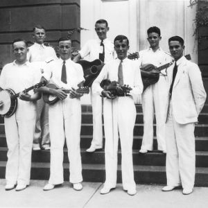 Members of a Johnston County string band, including violin, mandolin, banjo and guitar, attending North Carolina State 4-H Short Course held at North Carolina State College in Raleigh