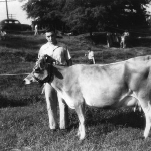 Bobby Suggs from Gastonia, North Carolina, showing his cow
