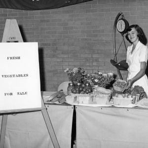 4-H club girl selling vegetables