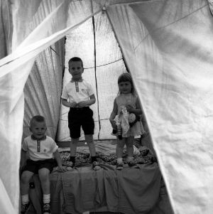 Children playing in tent