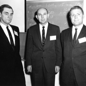 Stamm, Armstrong, and Trageser at a State seminar