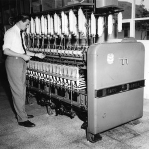 Man with Saco-Lowell machine
