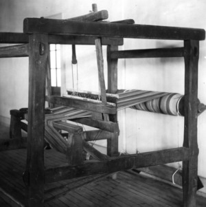 Old hand loom in Tompkins Hall
