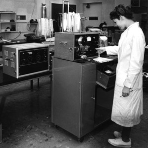 Carolyn Hunt working in a College of Textiles testing lab