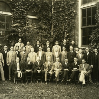 Textiles senior class and faculty in front of Tompkins Hall