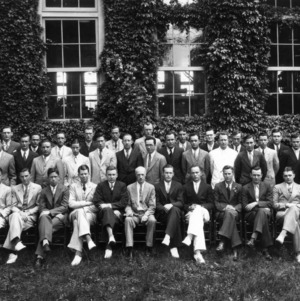 Seniors of 1934 with faculty in front of Tompkins Hall