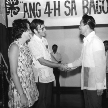 Carolyn J. Seymour and Lee Hood Capps meeting Ferdinand E. Marcos, President of the Republic of the Philippines