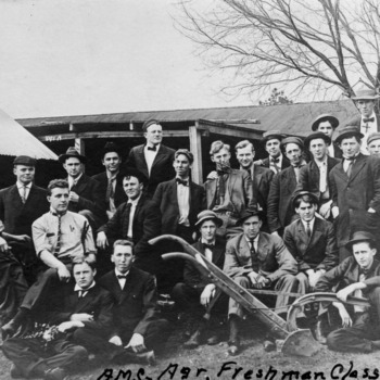 North Carolina College of Agriculture and Mechanic Arts freshman class posing with agricultural machinery, 1909
