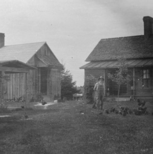 Mr. and Mrs. Jarvis in front of their home in Forsyth County, North Carolina, August 18, 1926