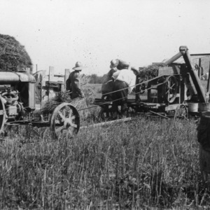 Threshing wheat on fertilizer plots at the Iredell Branch station, June 26, 1923