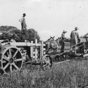 Threshing wheat in Statesville, North Carolina, June 16, 1923