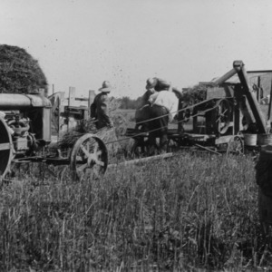 Threshing wheat in Statesville, North Carolina, June 26, 1923