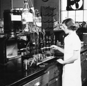 Unidentified woman in a tobacco lab