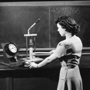 Unidentified woman in a tobacco lab