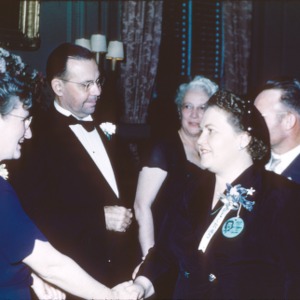D. S. Weaver and others shaking hands in a receiving line