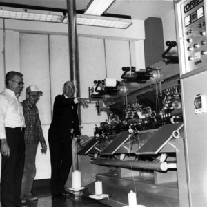 Peter Lord and others with laboratory machinery