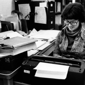 Judy Radford at typewriter