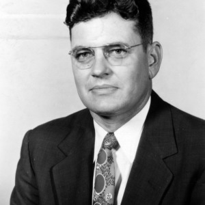 Dr. Talmage B. Young