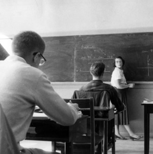 Woman teaching a math class