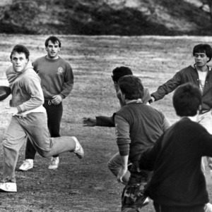 Students playing football on Harris field