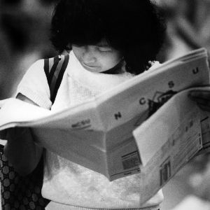 Student reading newspaper