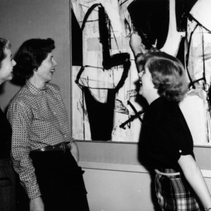 Women looking at abstract art