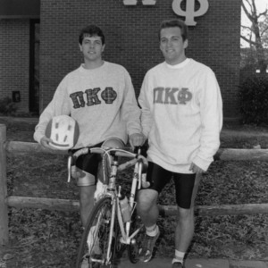 Two students train for a bike tour