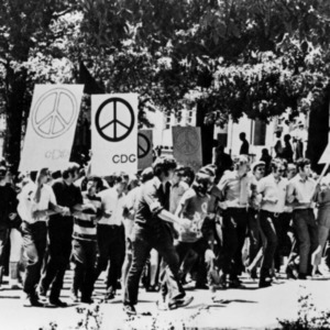 Students protesting with peace signs