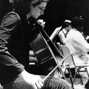 Music student playing the cello