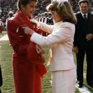 Homecoming Queen Melody Speek during halftime, 1984