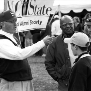 A group at the NC State Alumni Association tailgate event, 1997